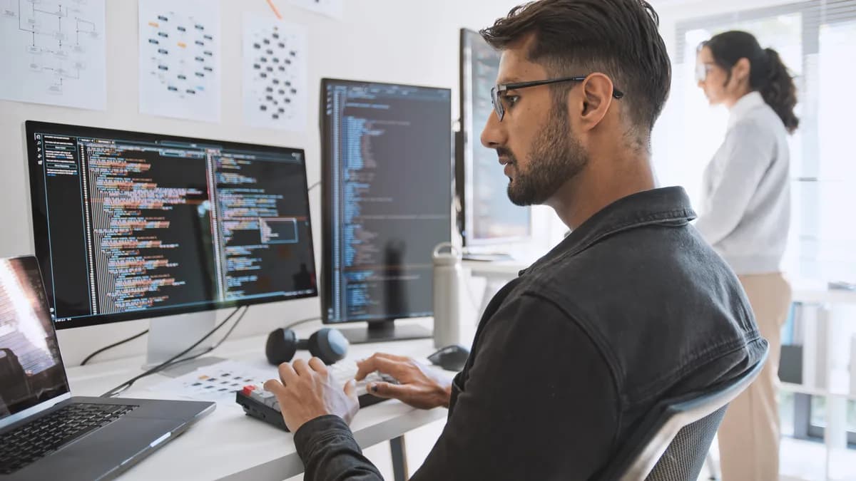A skilled AI engineer working on machine learning models, analyzing data, and coding AI algorithms on a high-tech computer setup.