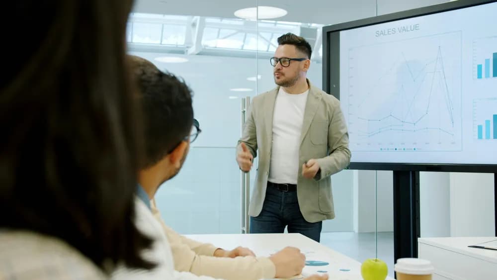 A team of data professionals analyzing live data, representing the collaborative and real-time nature of Big Data initiatives in modern organizations.