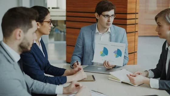 Business analysts collaborating on data insights in a modern workplace. In 2026, the Business Analyst role is more critical than ever, driving data-informed decisions across industries