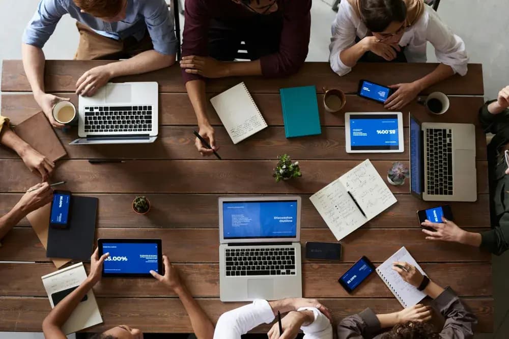 Business analytics professionals collaborating on data strategy in a modern office in 2026