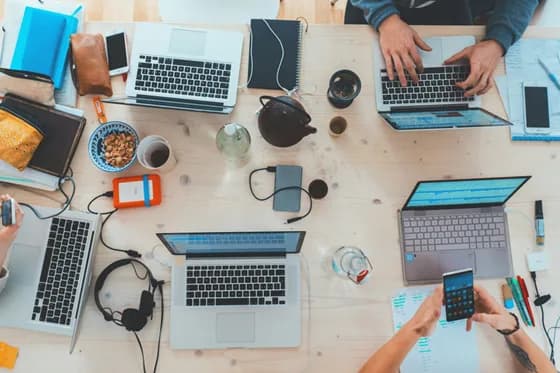 A cloud development team collaborating in a modern workspace