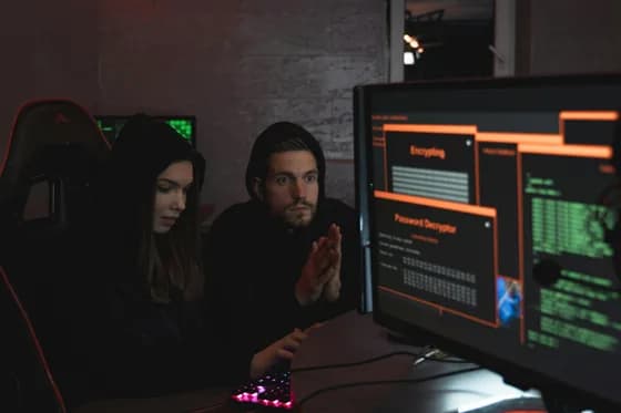 Cybersecurity professionals collaborating to analyze and neutralize threats in real time. In 2026, skilled teams like these are in higher demand than ever as organizations prioritize robust digital defense.