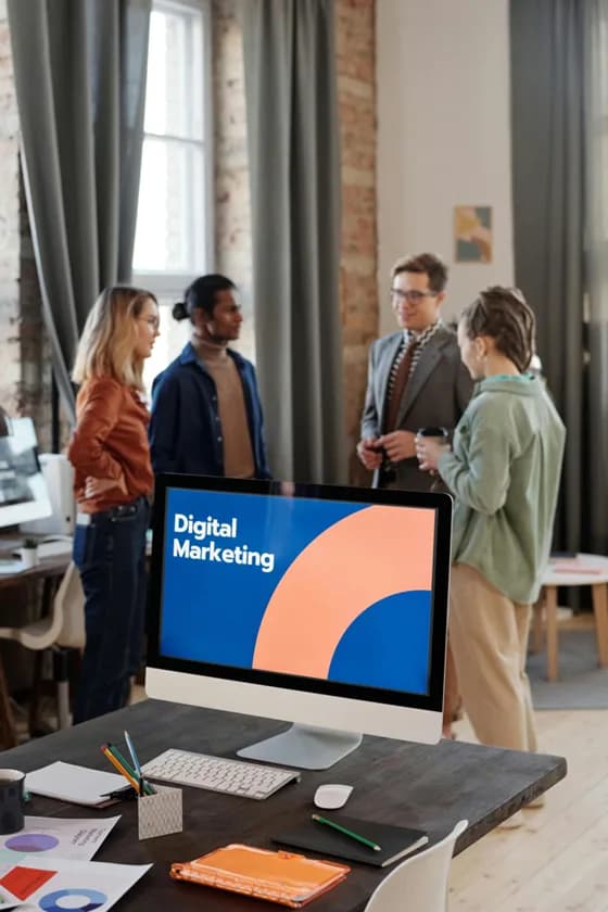 A digital marketing team strategizes in a modern office. In 2026, success comes from blending data-driven insights with creative engagement