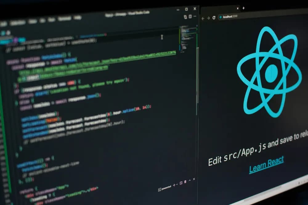 Professional frontend developer working on React project with JavaScript code and live interface preview on multiple screens, representing frontend-development in 2026 and modern web development workflow