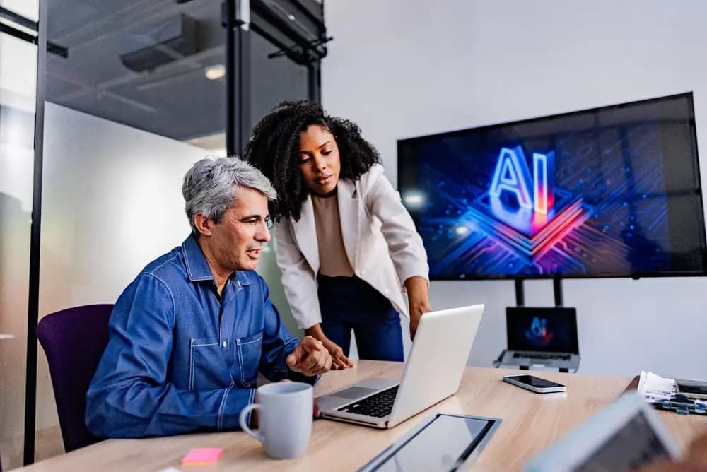 Real cloud engineering team collaborating on a prompt-engineering-program workflow for deploying and monitoring enterprise AI applications in 2026.