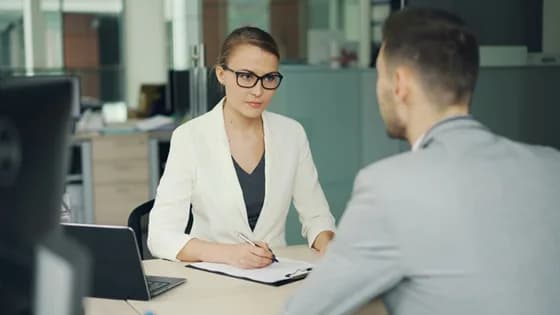 In 2026, successful talent acquisition still hinges on human connections. While technology streamlines the process, face-to-face (or screen-to-screen) interviews remain pivotal for assessing cultural fit and building mutual trust. The best hiring strategies blend efficient digital tools with genuine personal engagement, as illustrated by a recruiter conducting a thoughtful in-person interview above.